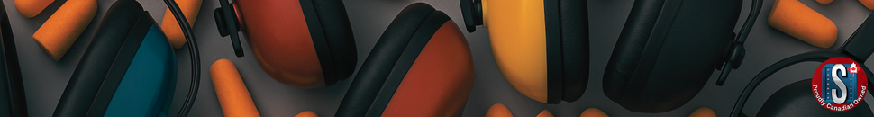 Assorted industrial earmuffs and orange foam earplugs arranged on a dark surface, representing Skookum Tools’ hearing protection category for noise reduction and workplace safety.