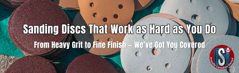 Sanding discs in various grits and styles, including hook and loop and PSA, displayed in neat stacks on a teal surface. Overlaid bold white text reads: ‘Sanding Discs That Work as Hard as You Do – From Heavy Grit to Fine Finish — We’ve Got You Covered.’ A circular Skookum Tools ‘Proudly Canadian Owned’ logo is featured in the bottom right corner.